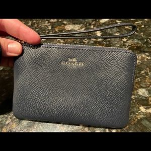 Cute navy wristlet.